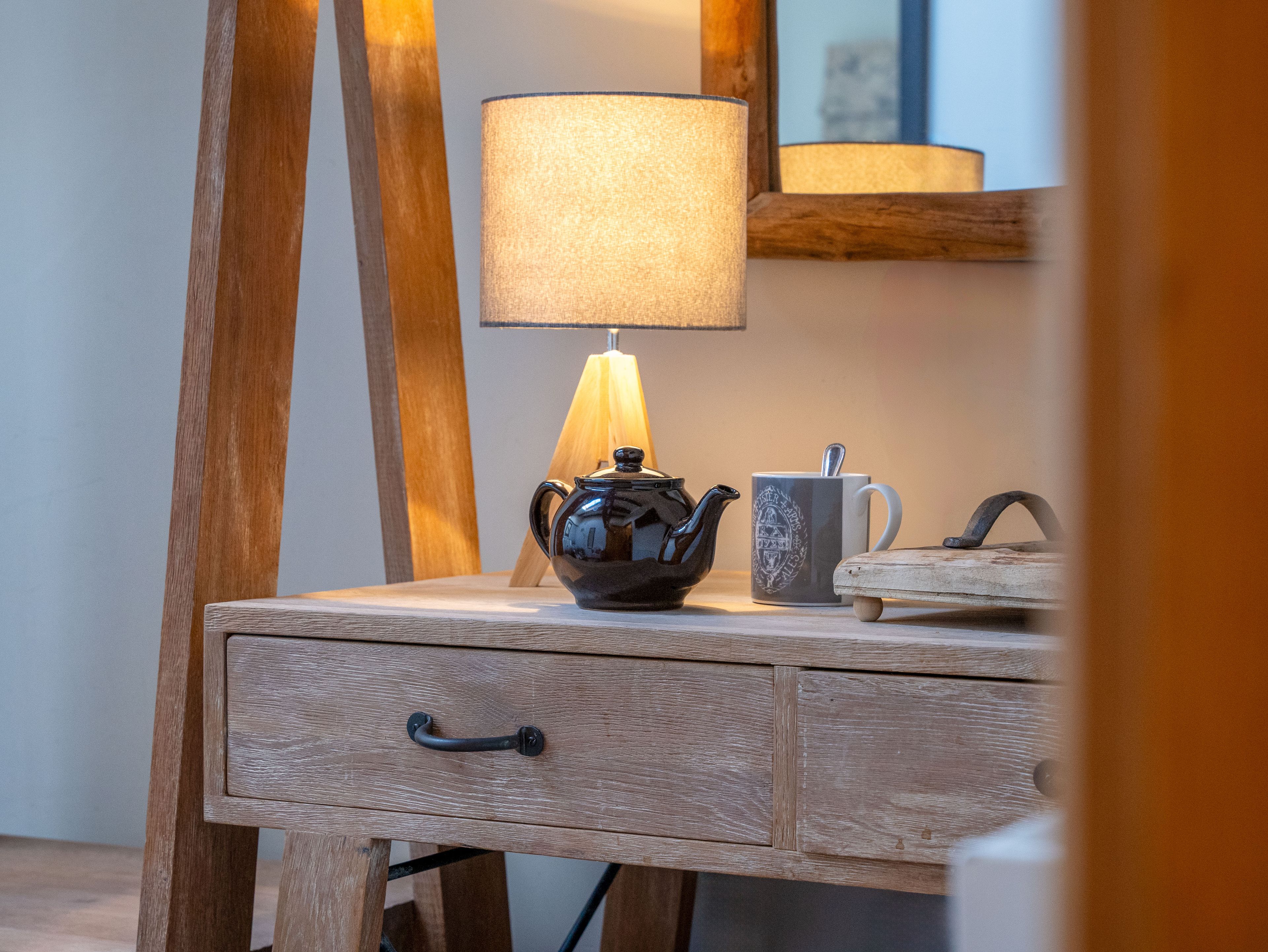 feature room wood desk and coffee mug